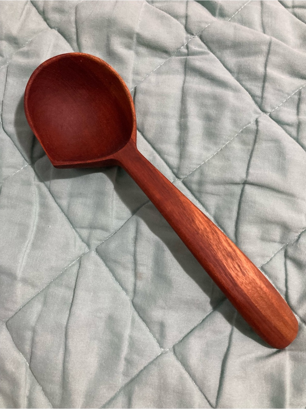 Hand carved wooden ladle